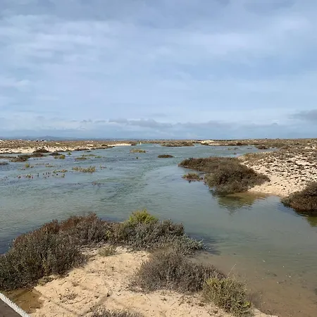 De La Casa Paraiso Avec, En Plus, Terrasse Privative Exterieure Semi Couverte Equipee D'un Salon D'un Coin Repas D'une Kitchenette, La Grande Piscine Et Les Jardins Sont Partages, A Proximite Des Plages De Fuseta Et De La Ria Formosa Ferienhaus *